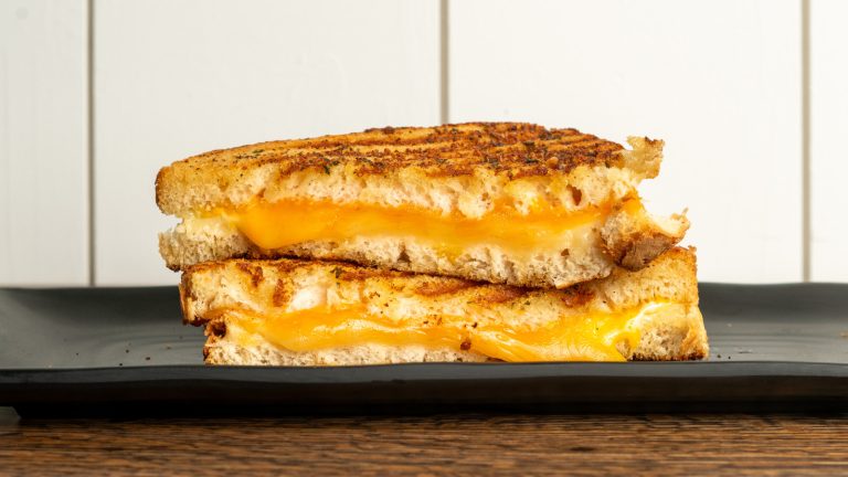 The Crispy Breakfast Ingredient That Will Elevate Your Grilled Cheese