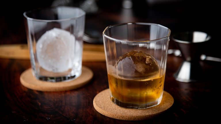 Why Ice Spheres Outperform Cubes in Strong Alcoholic Beverages