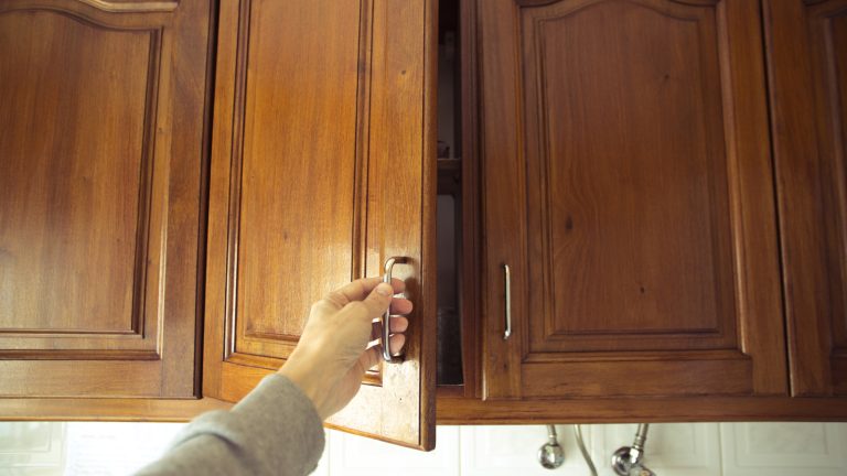 Degrease Your Kitchen Cabinets Using This Everyday Pantry Staple