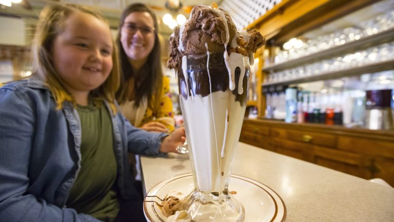 What is the Origin of the Name "Tin Roof Sundae"?