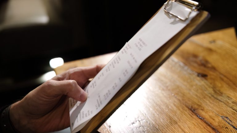 The Essential Etiquette Rule for Handling the Bill When Dining Out