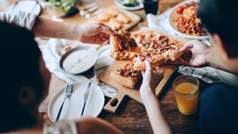Why Is Eating Pizza on Friday Night a Popular Tradition?