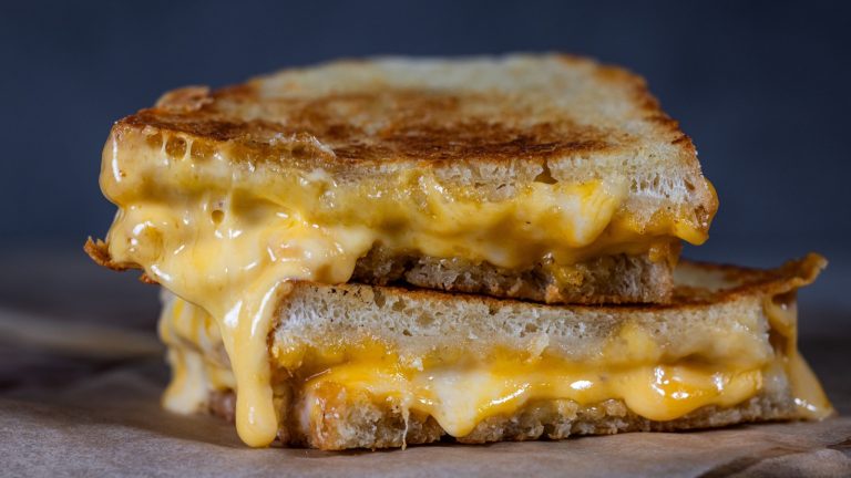 Enhance Your Grilled Cheese Sandwich with a Savory Salty Topping