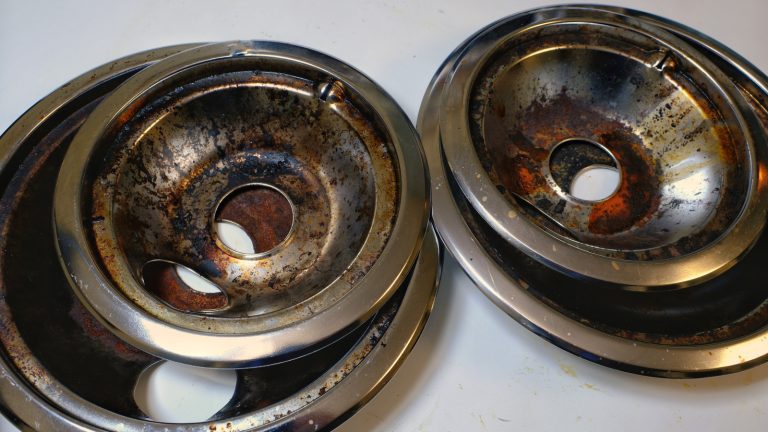 The Right Way to Clean Your Stove's Drip Pans