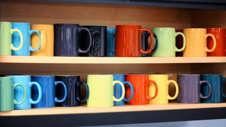 Transform Your Kitchen Windowsill with Fresh Herbs in a Repurposed Coffee Mug