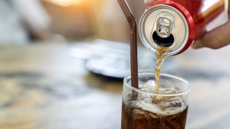 Master the Art of Pouring Canned Soda into a Glass with This Simple Trick